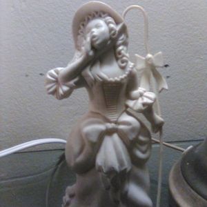 Avon fragrance figurine